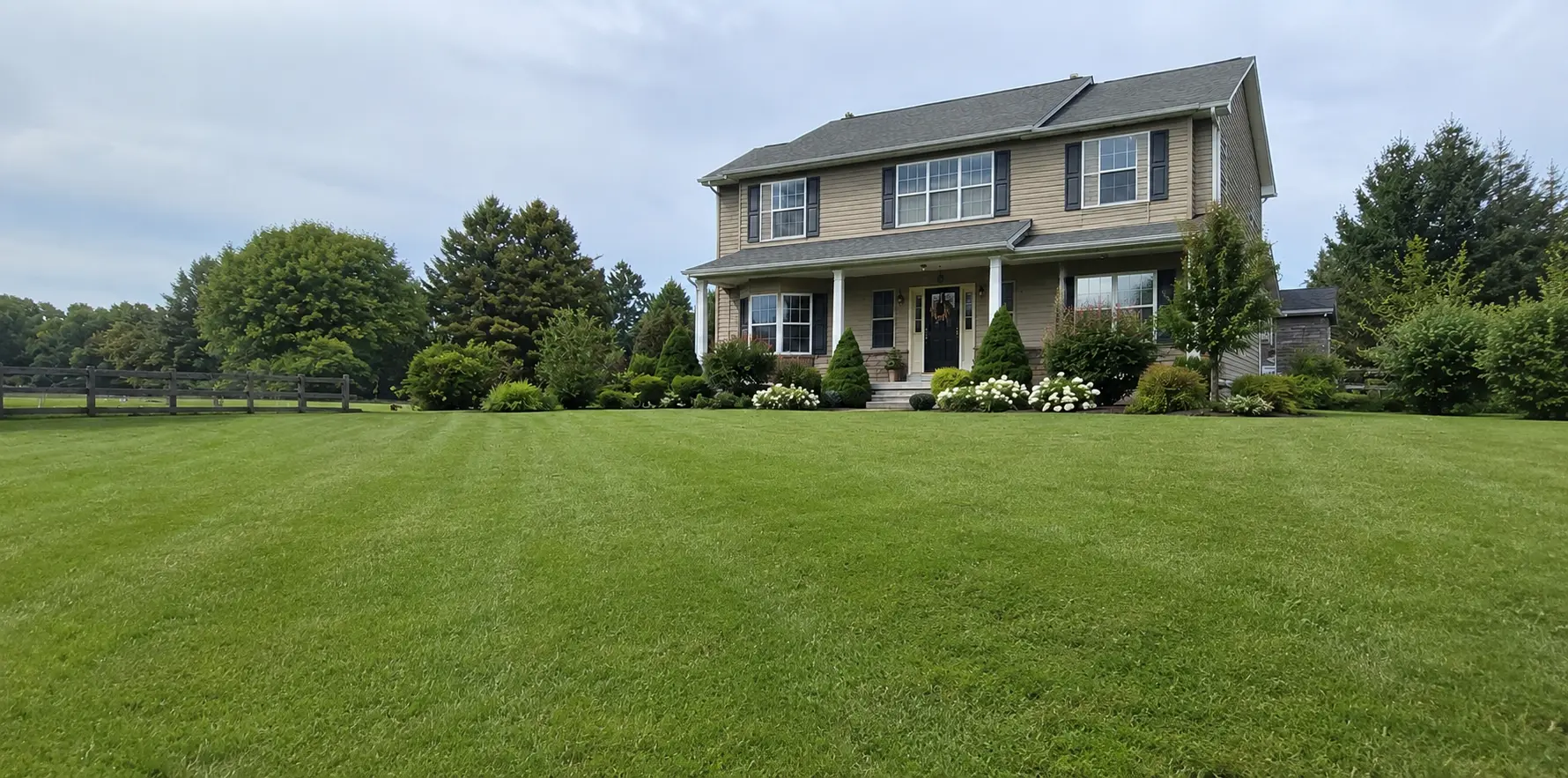 Luxury landscaped property at golden hour